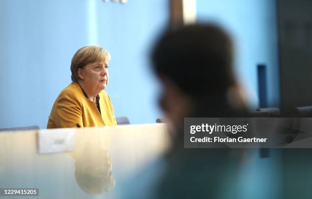 German Chancellor Angela Merkel speaks to the media following a meeting of the German government coronavirus cabinet task force during the second...