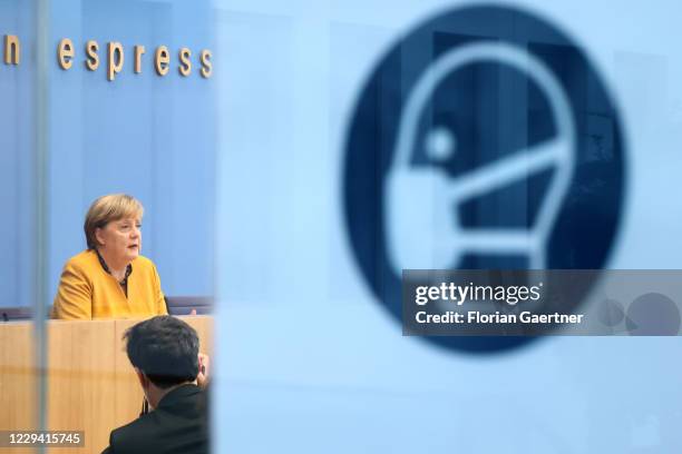 German Chancellor Angela Merkel speaks to the media following a meeting of the German government coronavirus cabinet task force during the second...