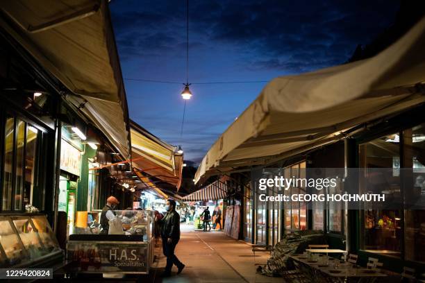 Market stalls are pictured at the Naschmarkt in Vienna on November 2 a few hours before a second lockdown during the ongoing novel coronavirus...