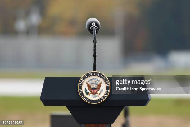 General view of the Vice Presidential seal is seen on the podium before the start of a campaign rally by Vice President Mike Pence on October 23,...