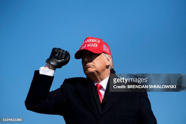 President Donald Trump leaves after speaking during a Make America Great Again rally at Fayetteville Regional Airport November 2 in Fayetteville,...