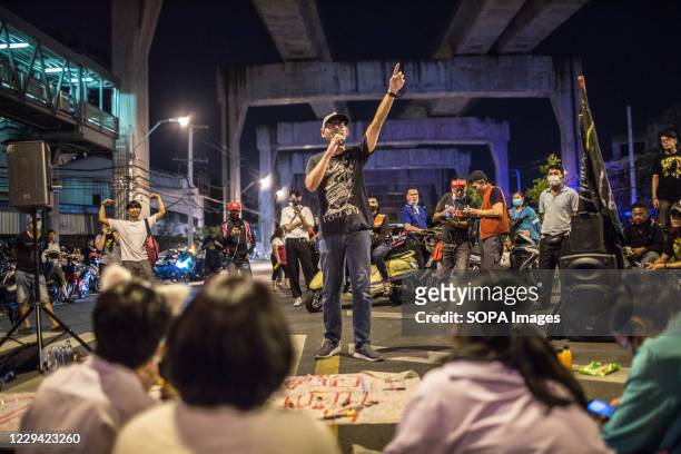 Pro-democracy protester raps in front of students during an anti-government demonstration in the Thai Capital. Thousands of pro-democracy protesters...