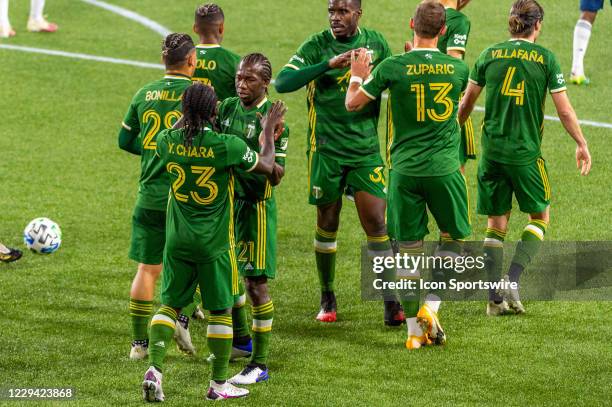 Portland Timbers brothers Yimmi and Diego Chara celebrate a goal during the Portland Timbers game against the Vancouver Whitecaps on November 01 at...