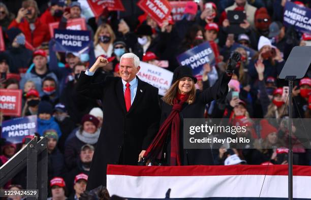 Vice President Mike Pence and second lady Karen Pence greet supporters at a rally on November 2, 2020 in Traverse City, Michigan. President Trump and...