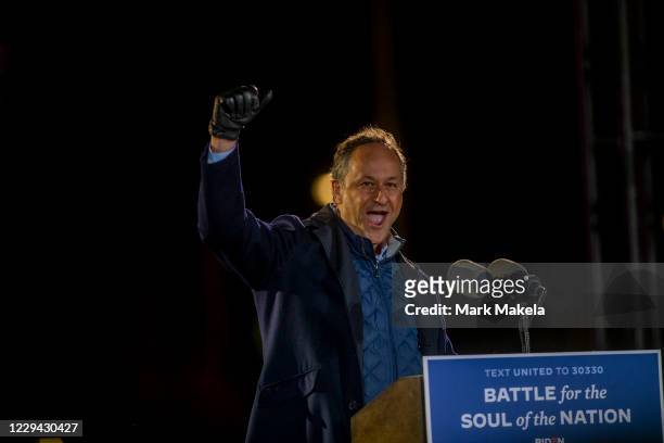 Douglas Emhoff, husband to Democratic vice presidential nominee Sen. Kamala Harris , speaks during a drive-in election eve rally on November 2, 2020...