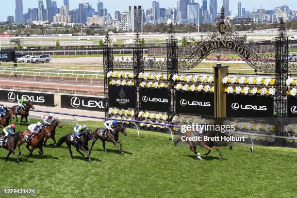 Outrageous ridden by William Pike wins the Grinders Coffee Roasters Trophy at Flemington Racecourse on November 03, 2020 in Flemington, Australia.