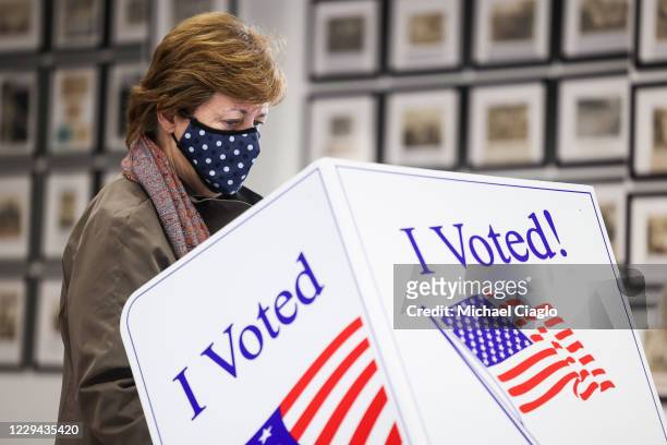 Woman casts her vote at the Hazel Parker Playground on Election Day on November 3, 2020 in Charleston, United States. After a record-breaking early...