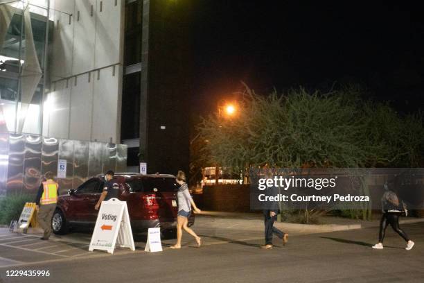 Voters enter Burton Barr Central Library to cast their ballots on November 3, 2020 in Phoenix, Arizona. After a record-breaking early voting turnout,...