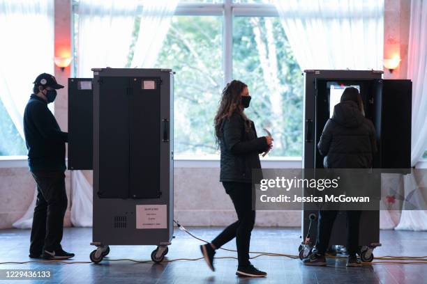 Voters cast ballots at the Park Tavern polling station on November 3, 2020 in Atlanta, Georgia. After a record-breaking early voting turnout,...