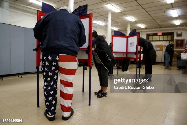 Ted Zagrodny fills out his ballot at Saint John the Baptist Parish in Quincy, MA on election day, November 03, 2020. Massachusetts voters headed to...