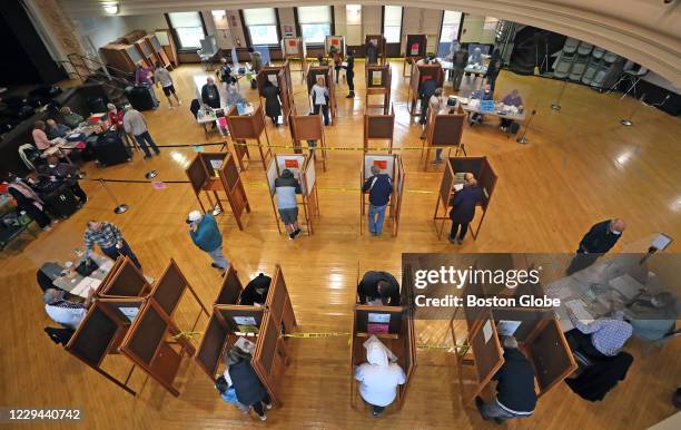 Voters practice social distancing while voting in the 2020 election at Whitman Town Hall in Whitman, MA on Election Day, Nov. 3, 2020. Massachusetts...