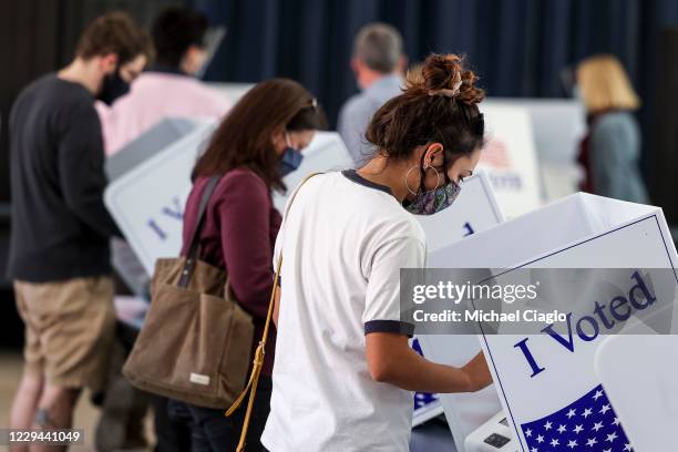 People vote at James Island Charter High School on Election Day on November 3, 2020 in Charleston, South Carolina. After a record-breaking early...