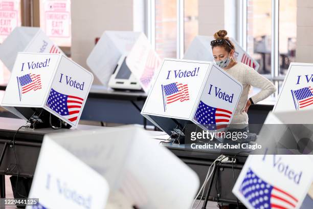 Woman votes at James Island Charter High School on Election Day on November 3, 2020 in Charleston, South Carolina. After a record-breaking early...