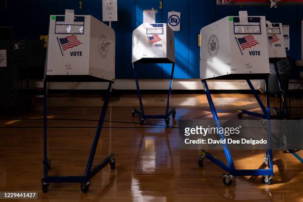 Voting booths at Public School 160 on November 3, 2020 in the Brooklyn borough of New York City. After a record-breaking early voting turnout,...