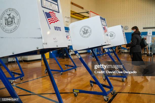 Voter walks to a booth to fill out their ballot at Public School 160 on November 3, 2020 in the Brooklyn borough of New York City. After a...
