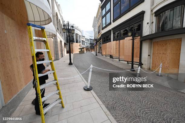 Rodeo Drive, the world renowned shopping street in Beverly Hills, California, is boarded up and closed to vehicular and pedestrian traffic on...