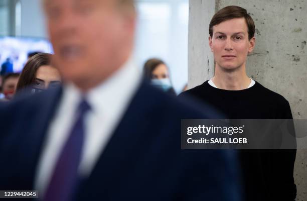 White House Senior Advisor Jared Kushner listens as US President Donald Trump visits his campaign headquarters in Arlington, Virginia, November 3,...