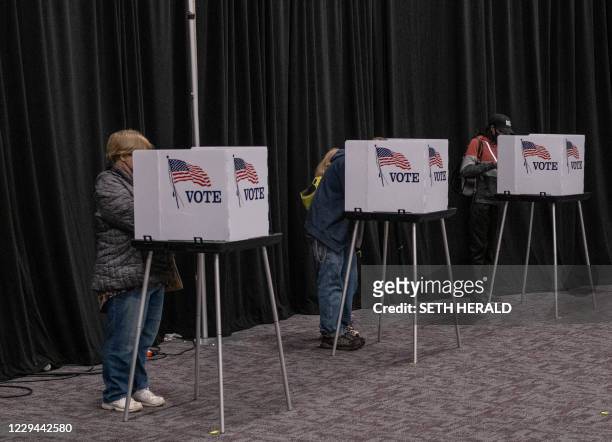 Residents of Lansing, Michigan, cast their votes November 3 at the Lansing Public Media Center a polling station.