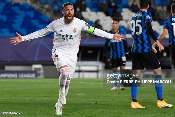 Real Madrid's Spanish defender Sergio Ramos celebrates his goal during the UEFA Champions League group B football match between Real Madrid and Inter...