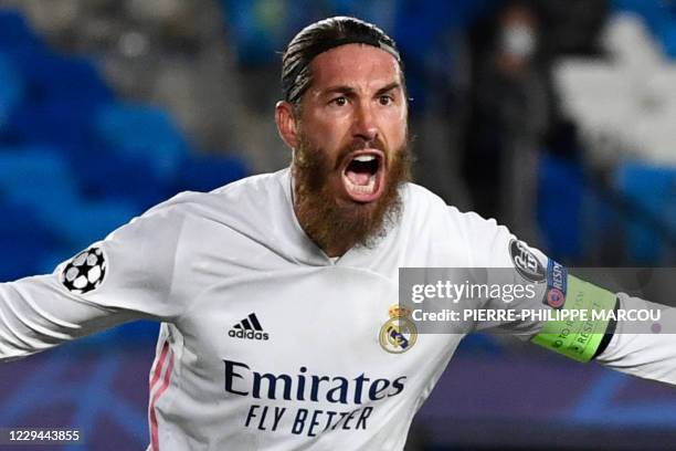 Real Madrid's Spanish defender Sergio Ramos celebrates his goal during the UEFA Champions League group B football match between Real Madrid and Inter...