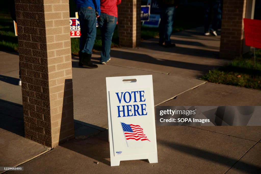 A "Vote here" sign seen on Election Day 2020 at St. John the...