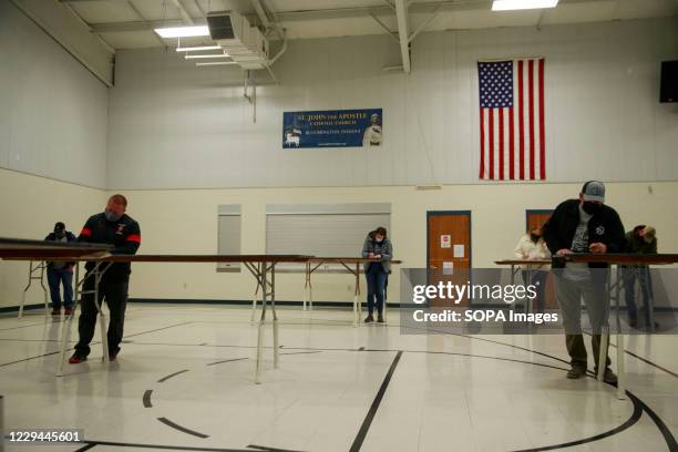 Voters cast their ballots at St. John the Apostle Catholic Church on Election Day 2020. Polling stations across the United States open for voters to...