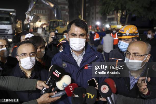 Turkish Minister of Environment and Urbanization Murat Kurum speaks to press after inspecting the site as search and rescue works continue at debris...