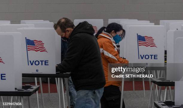 Residents cast their votes on November 3 at Mott Community College in Flint, Michigan.