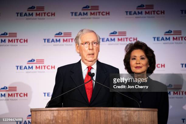 Senate Majority Leader Mitch McConnell , delivers his victory speech next to his wife, Elaine Chao, at the Omni Louisville Hotel on November 3, 2020...