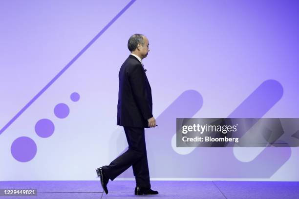 Masayoshi Son, chairman and chief executive officer of SoftBank Group Corp., leaves after he delivered a keynote speech at the Junior Chamber...