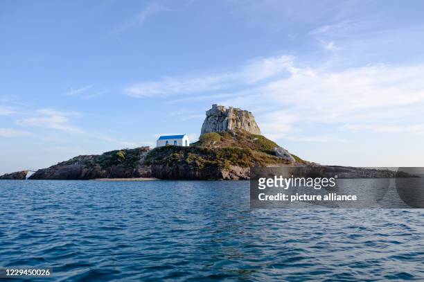 October 2020, Greece, Kefalos: View of the island Kastri with the church Agios Stefanos in front of the Greek island Kos near Kefalos. Photo: Robert...