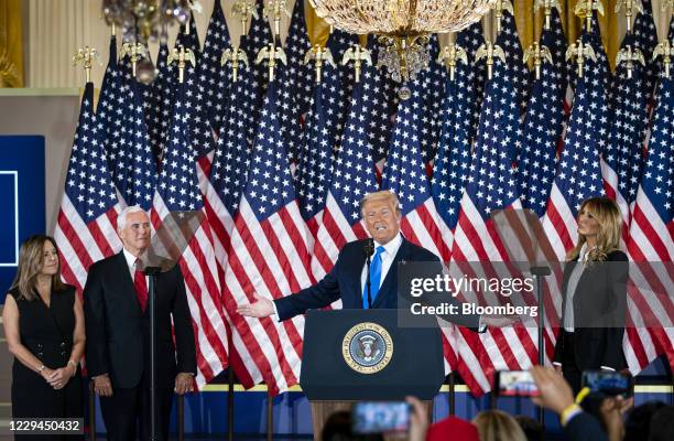 President Donald Trump, center, speaks as U.S. First Lady Melania Trump, from right, U.S. Vice President Mike Pence, and Second Lady Karen Pence...