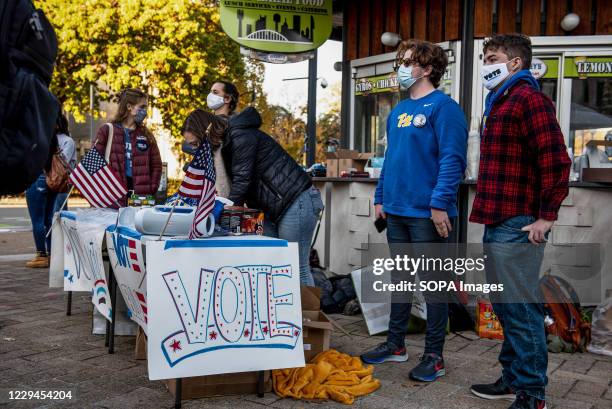 University of Pittsburgh students with Biden/Harris signs and stickers. On the University of Pittsburgh campus many students organizing get out the...