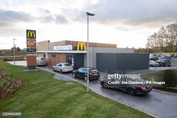 Cars queue at the drive thru of a new McDonald's restaurant, based on the outskirts of Oakham, which has opened as Rutland becomes the last county in...