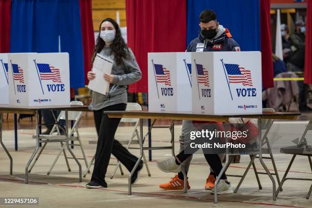 Voters casting their ballots in Derry, New Hampshire in the presidential election on November 3, 2020.