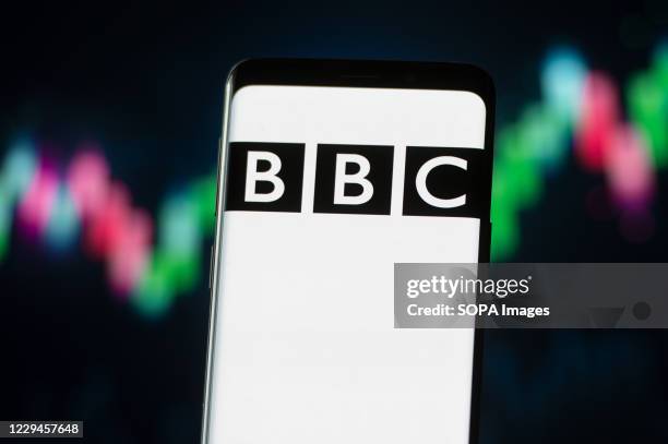 In this photo illustration a BBC logo seen displayed on a smartphone.