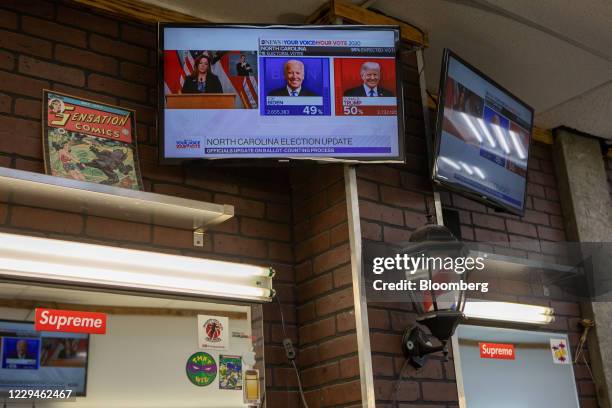 Television in a barbershop shows the news during the 2020 Presidential election in Miami, Florida, U.S., on Wednesday, Nov. 4, 2020. Trump won two...