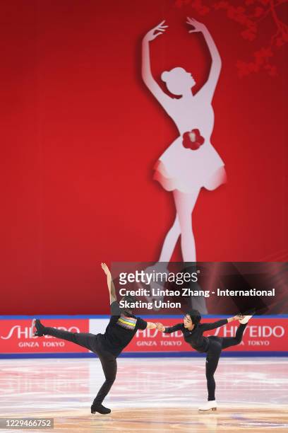 Han Cong and Sui Wenjing of China participate in pre-match training ahead of the ISU Grand Prix of Figure Skating Cup of China at Huaxi Sports Center...