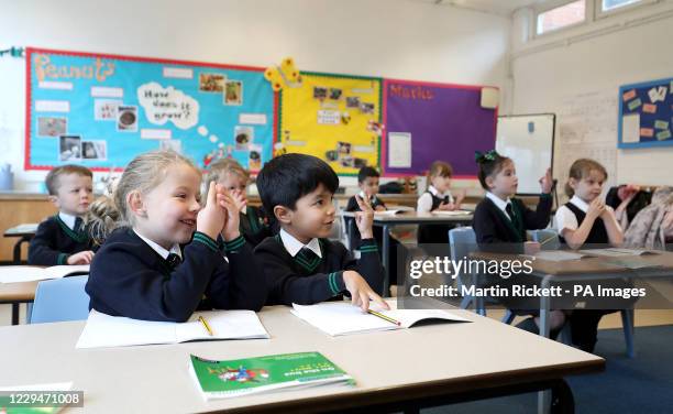 Pupils at Manor Park School and Nursery in Knutsford, Cheshire, take part in a phonics lesson, at the start of a four week national lockdown for...