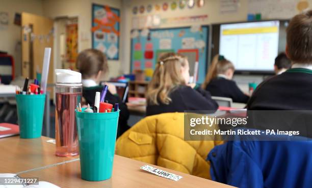 Year 4 pupils at Manor Park School and Nursery in Knutsford, Cheshire, take part in a maths lesson, at the start of a four week national lockdown for...