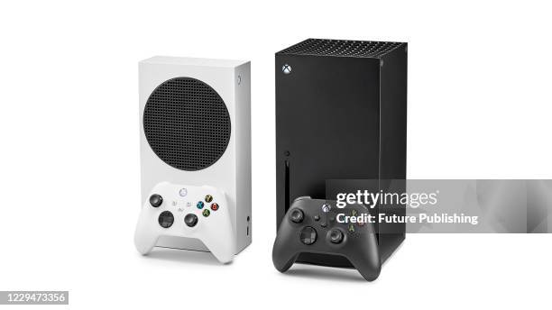Pair of Microsoft home video game consoles, including an Xbox Series S and Xbox Series X, taken on October 27, 2020.