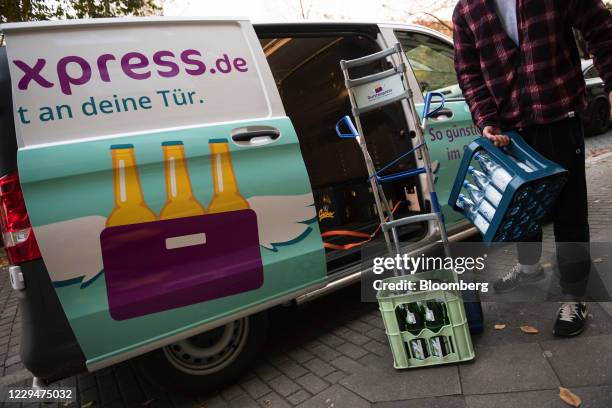 Durstexpress GmbH delivery worker delivers crates of beverages to a customer in Berlin, Germany, on Thursday, Nov. 5, 2020. German baking-mix maker...