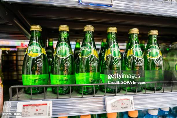 French natural bottled mineral water Perrier seen at a supermarket.