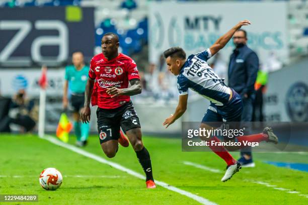 Fabian Castillo of Tijuana and Carlos Rodriguez of Monterrey compete for the ball during the Final second leg match between Monterrey and Tijuana as...
