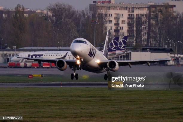 Polish Airlines airliner is seen taking off from Chopin International Airport in Warsaw, Poland on November 5, 2020. The Polish government has...