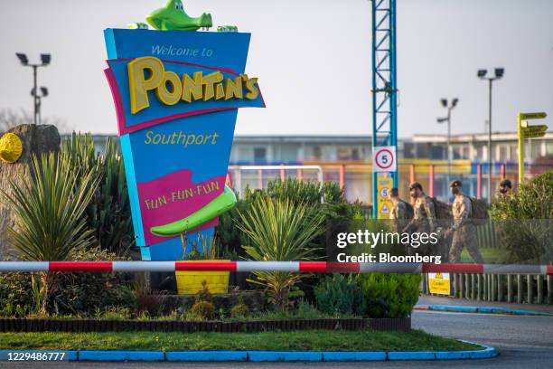 Members of the British Army walk at a Pontins holiday camp, ahead of the Liverpool coronavirus testing initiative, in Southport, U.K., on Friday,...