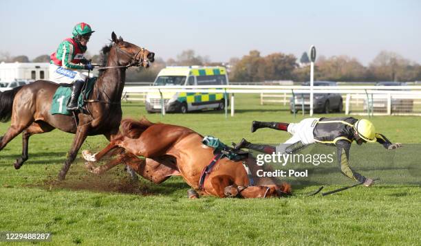 Sam Twiston-Davies is unseated from Camacho Man during the Visit racingtv.com Juvenile Hurdle at Warwick Racecourse on November 6, 2020 in Warwick,...