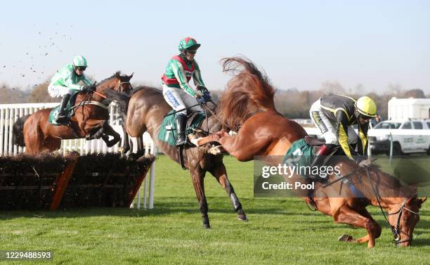 Sam Twiston-Davies is unseated from Camacho Man during the Visit racingtv.com Juvenile Hurdle at Warwick Racecourse on November 6, 2020 in Warwick,...