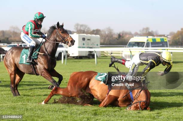 Sam Twiston-Davies is unseated from Camacho Man during the Visit racingtv.com Juvenile Hurdle at Warwick Racecourse on November 6, 2020 in Warwick,...