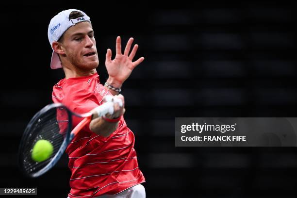 Argentina's Diego Schwartzman returns the ball to Russia's Daniil Medvedev during their men's singles quarter-final tennis match on day 5 at the ATP...